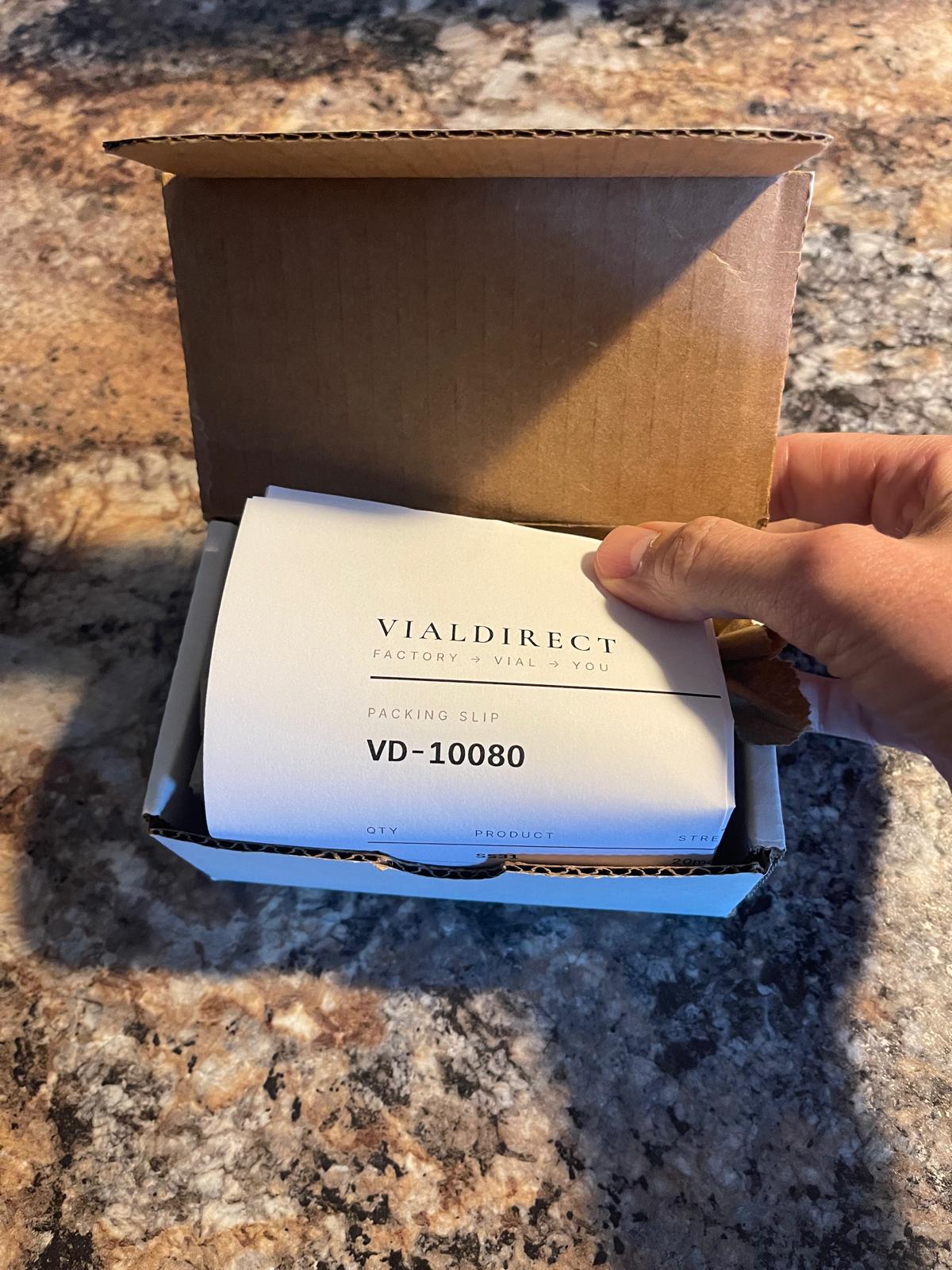 VialDirect packing slip with order number inside the shipping box